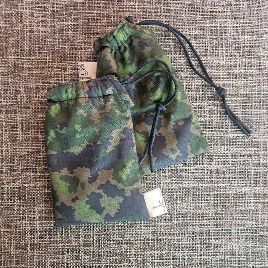 Aurinkolasi pussukka M05
